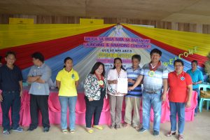 Dir. Tapispisan (4th from left) presents Foster Placement Authority to licensed foster parents, with Kasibu, Nueva Vizcaya Mayor Alberto D. Bumolo, Jr. (2nd from right),barangay officials,MSDWO and DSWD staff.